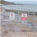 New signs along the sea wall